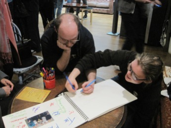 Designing our winning page at ClueQuest - photo by Juliamaud
